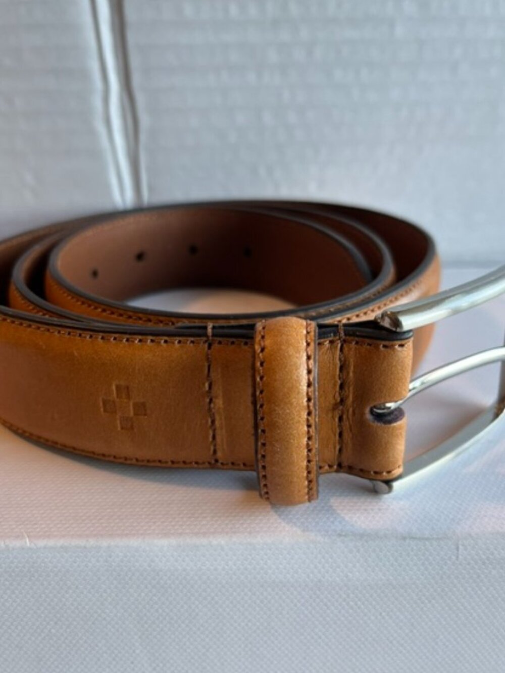 Vince Camuto men’s caramel leather belt.